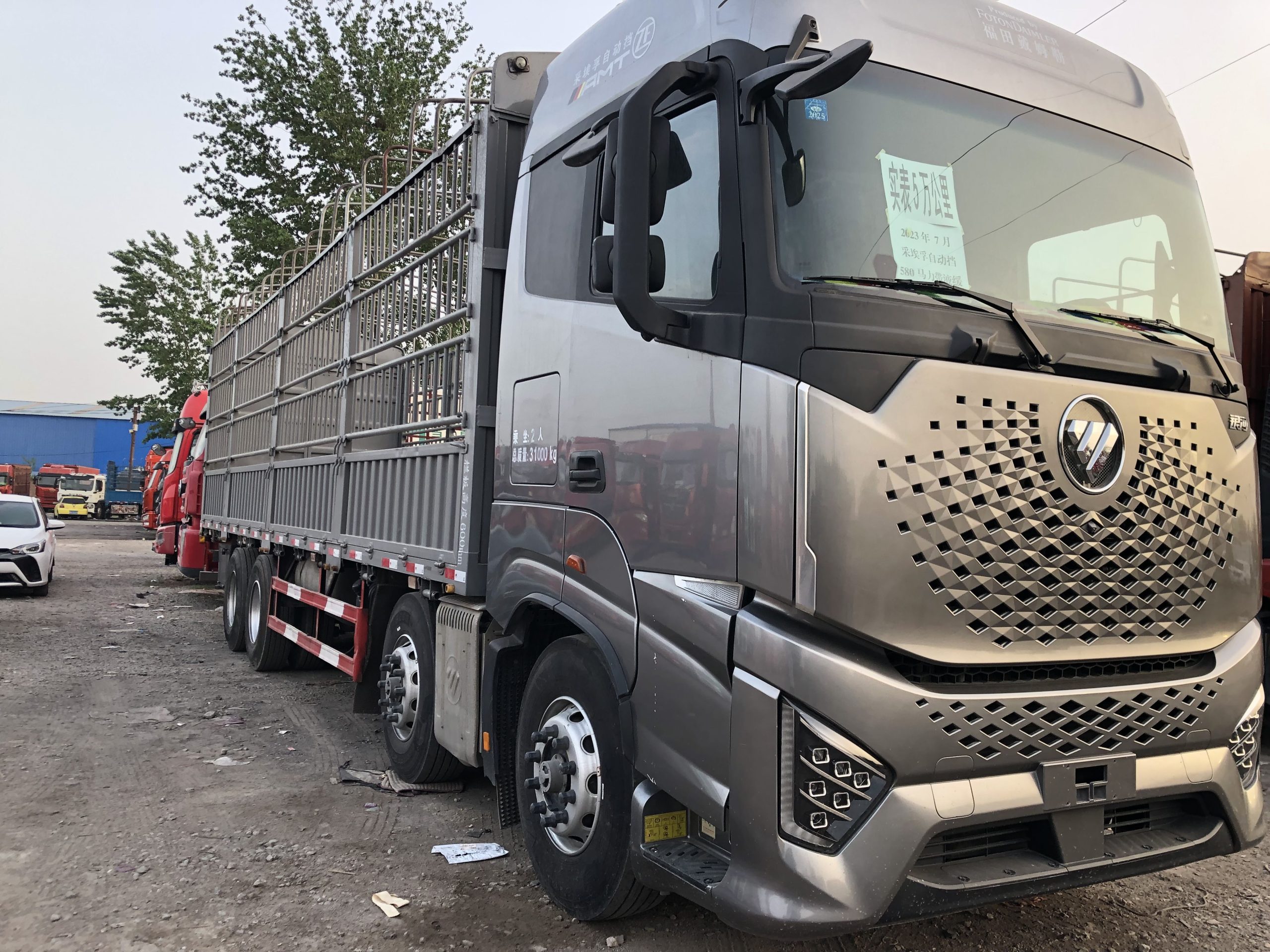 Used Auman 9.6m high sided truck